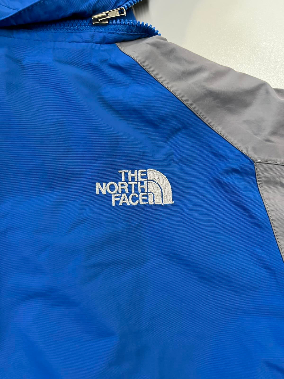 The North Face Youth Waterproof Blue and Gray Jacket