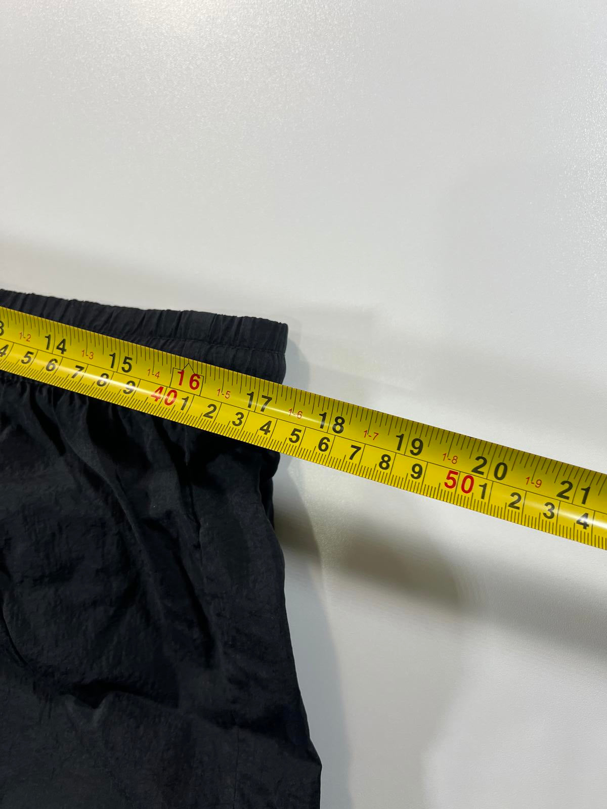 Vintage Reebok Black Athletic Shorts with Logo Detailing M