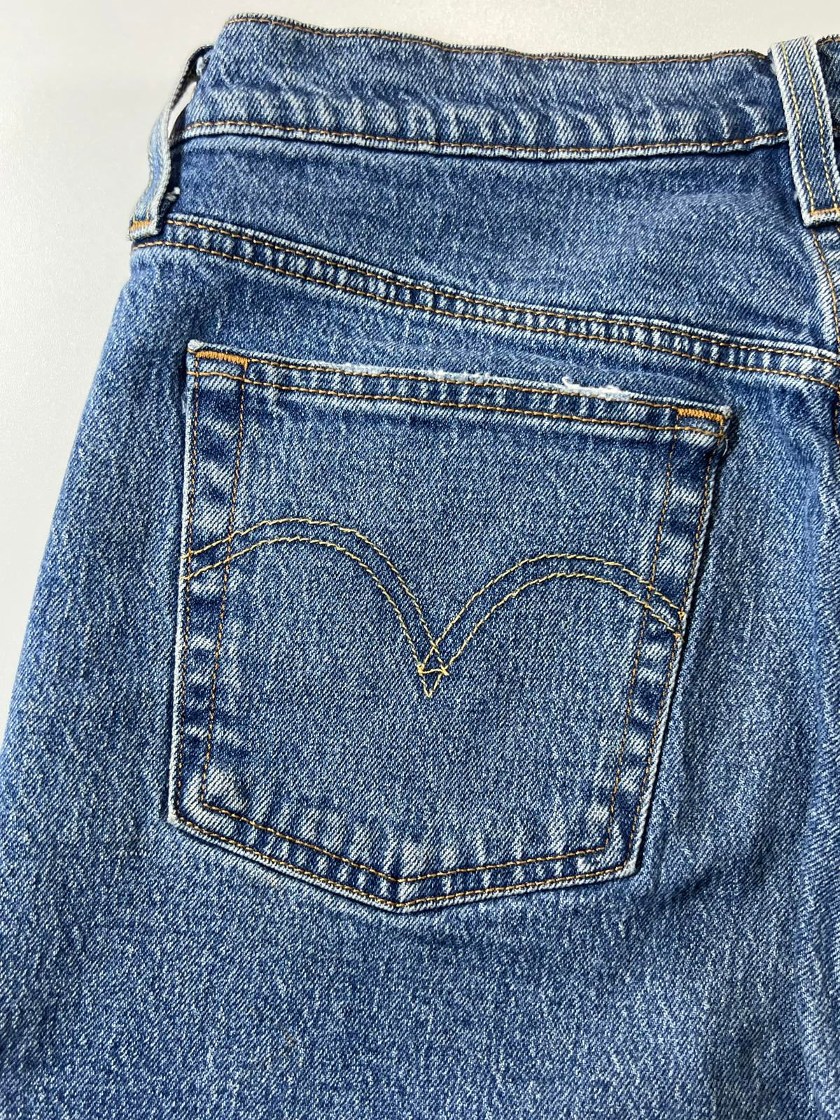 Vintage Levi’s 501 Blue Distressed Denim Shorts 30