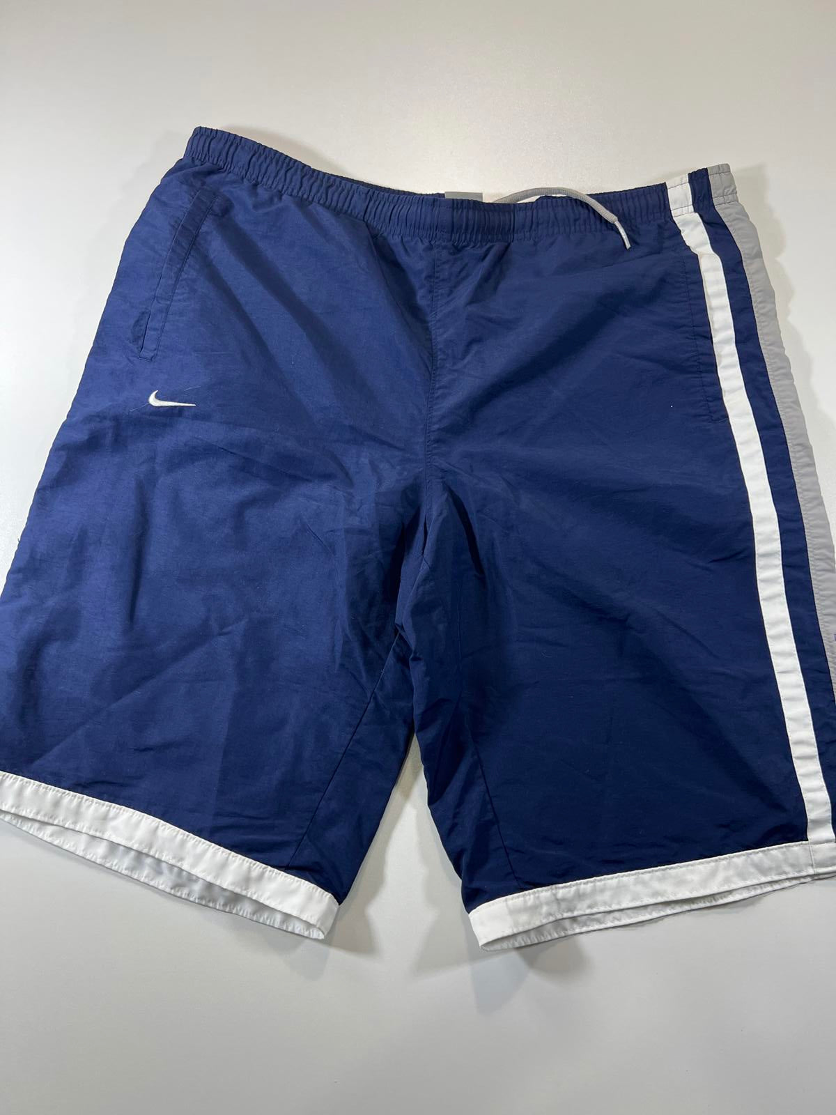 Vintage Nike Men's Navy Blue Athletic Shorts with White Trim