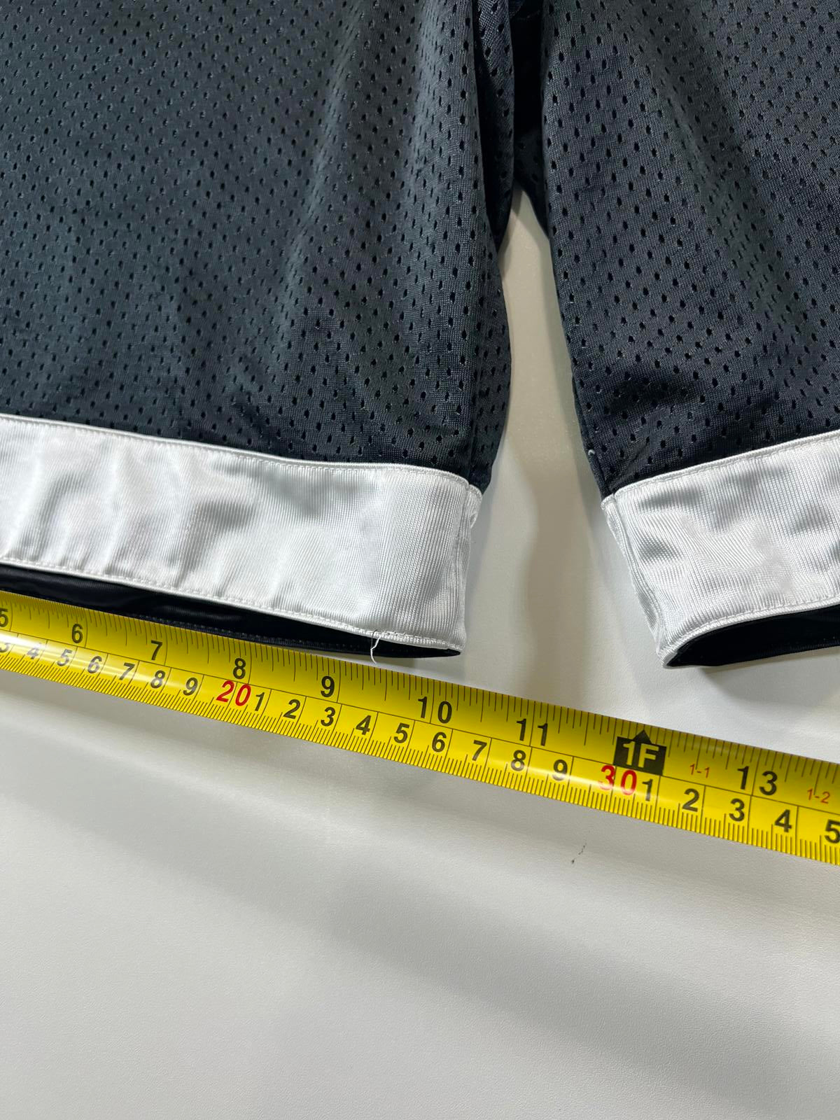 Nike Black Mesh Athletic Shorts with Silver Trim