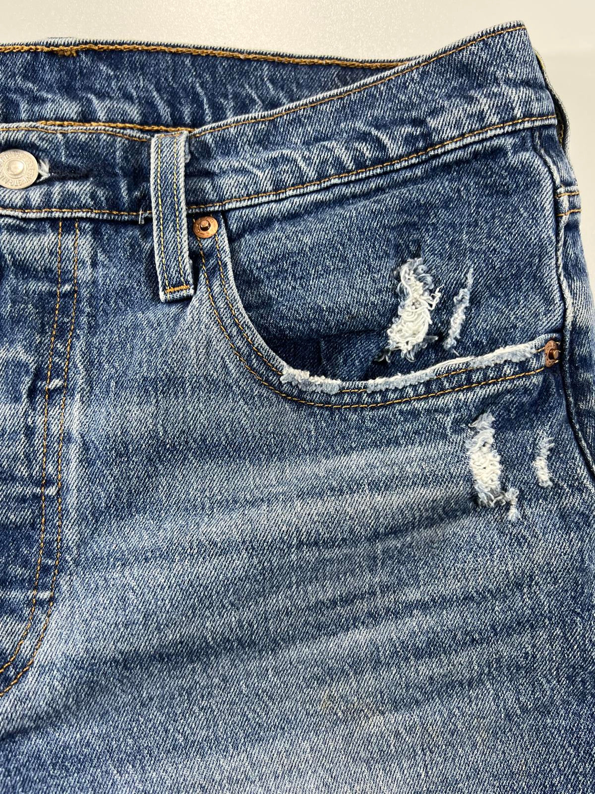 Vintage Levi’s 501 Blue Distressed Denim Shorts 30