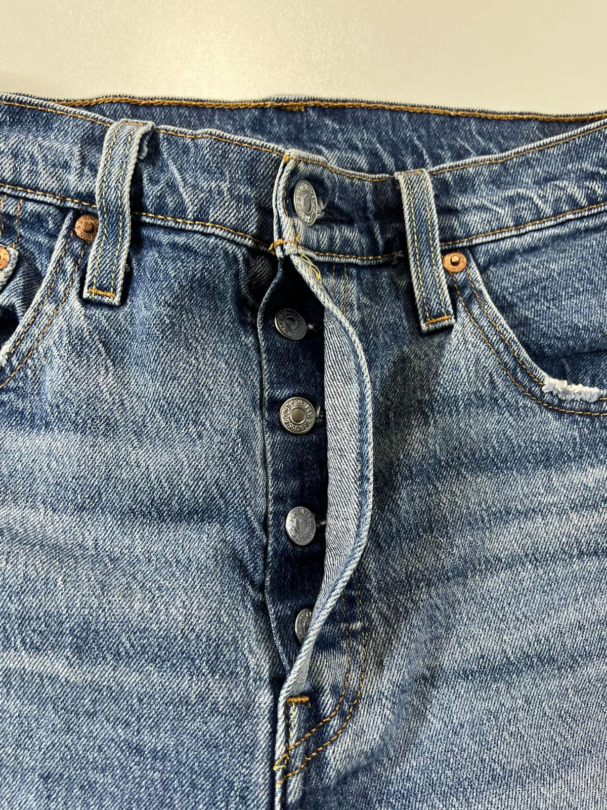 Vintage Levi’s 501 Blue Distressed Denim Shorts 30