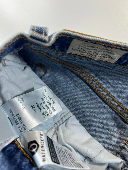 Vintage Levi’s 501 Blue Distressed Denim Shorts 30