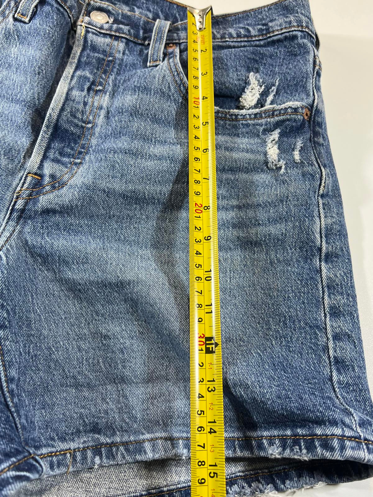 Vintage Levi’s 501 Blue Distressed Denim Shorts 30