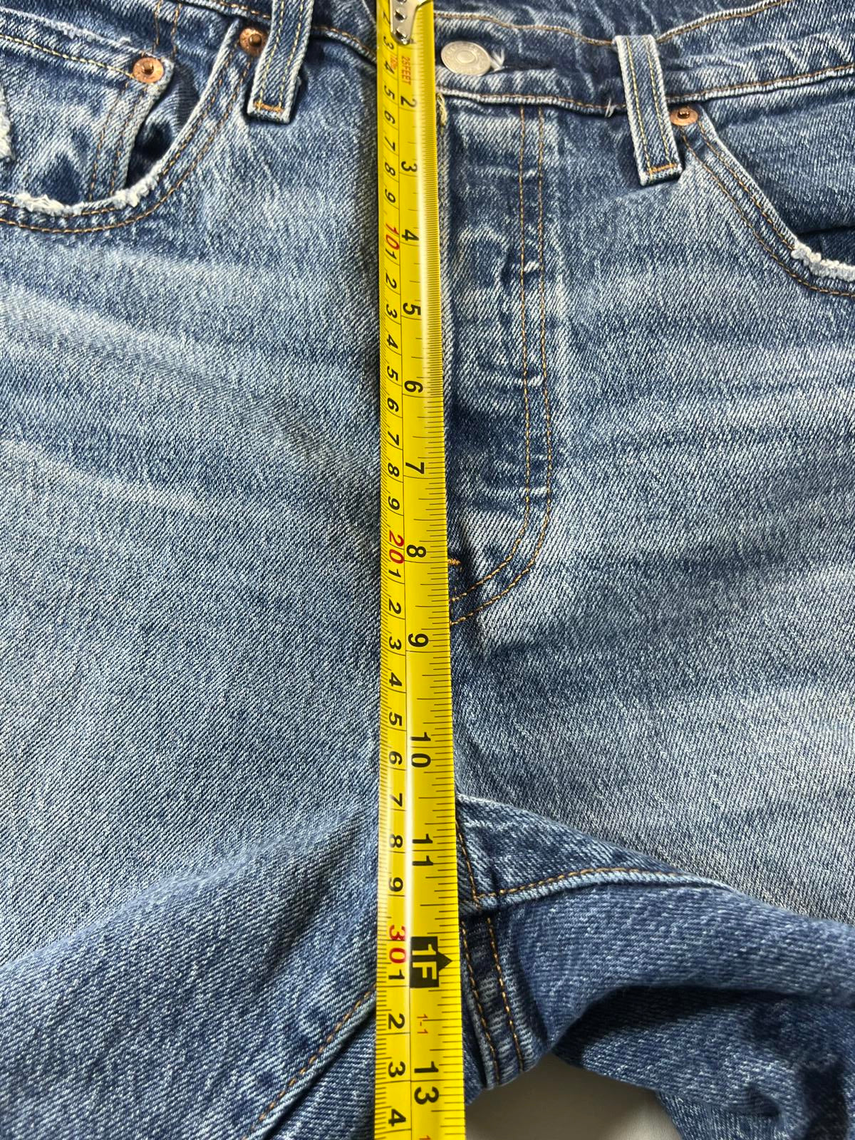 Vintage Levi’s 501 Blue Distressed Denim Shorts 30