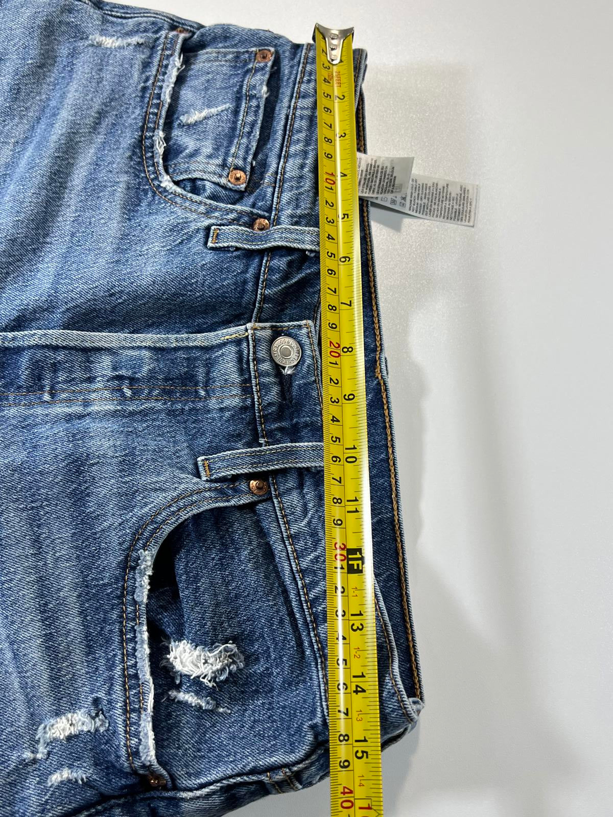 Vintage Levi’s 501 Blue Distressed Denim Shorts 30