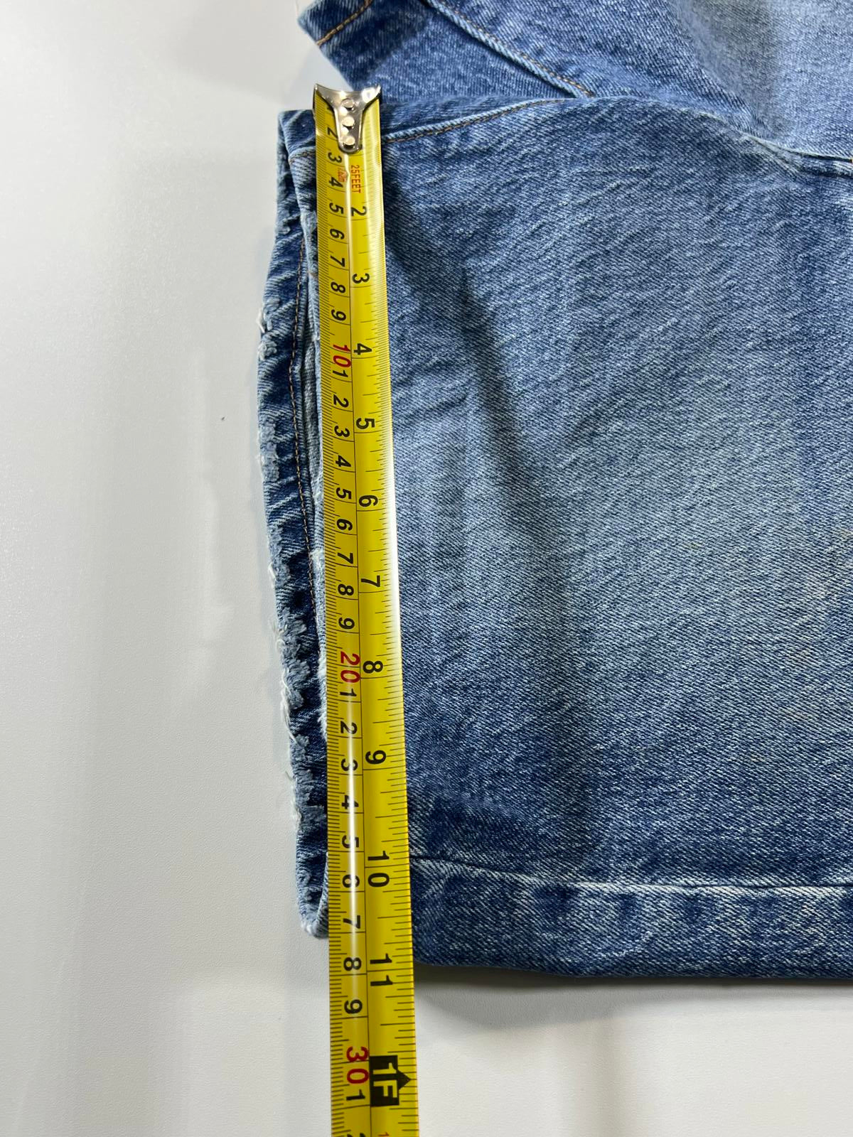 Vintage Levi’s 501 Blue Distressed Denim Shorts 30