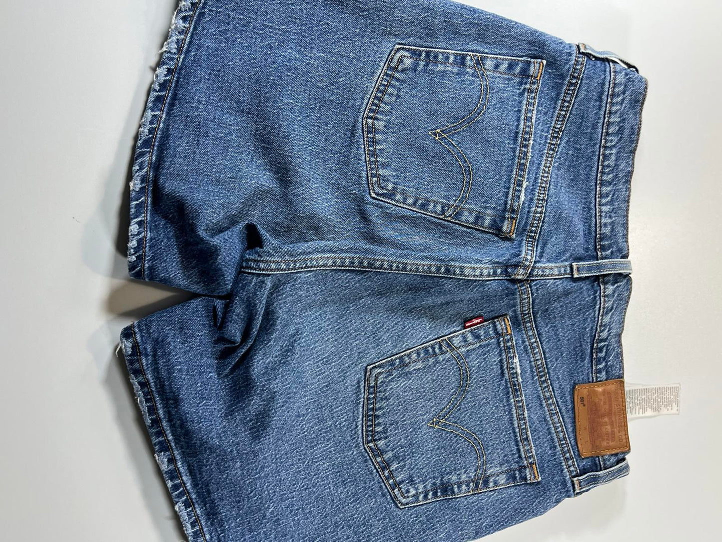 Vintage Levi’s 501 Blue Distressed Denim Shorts 30