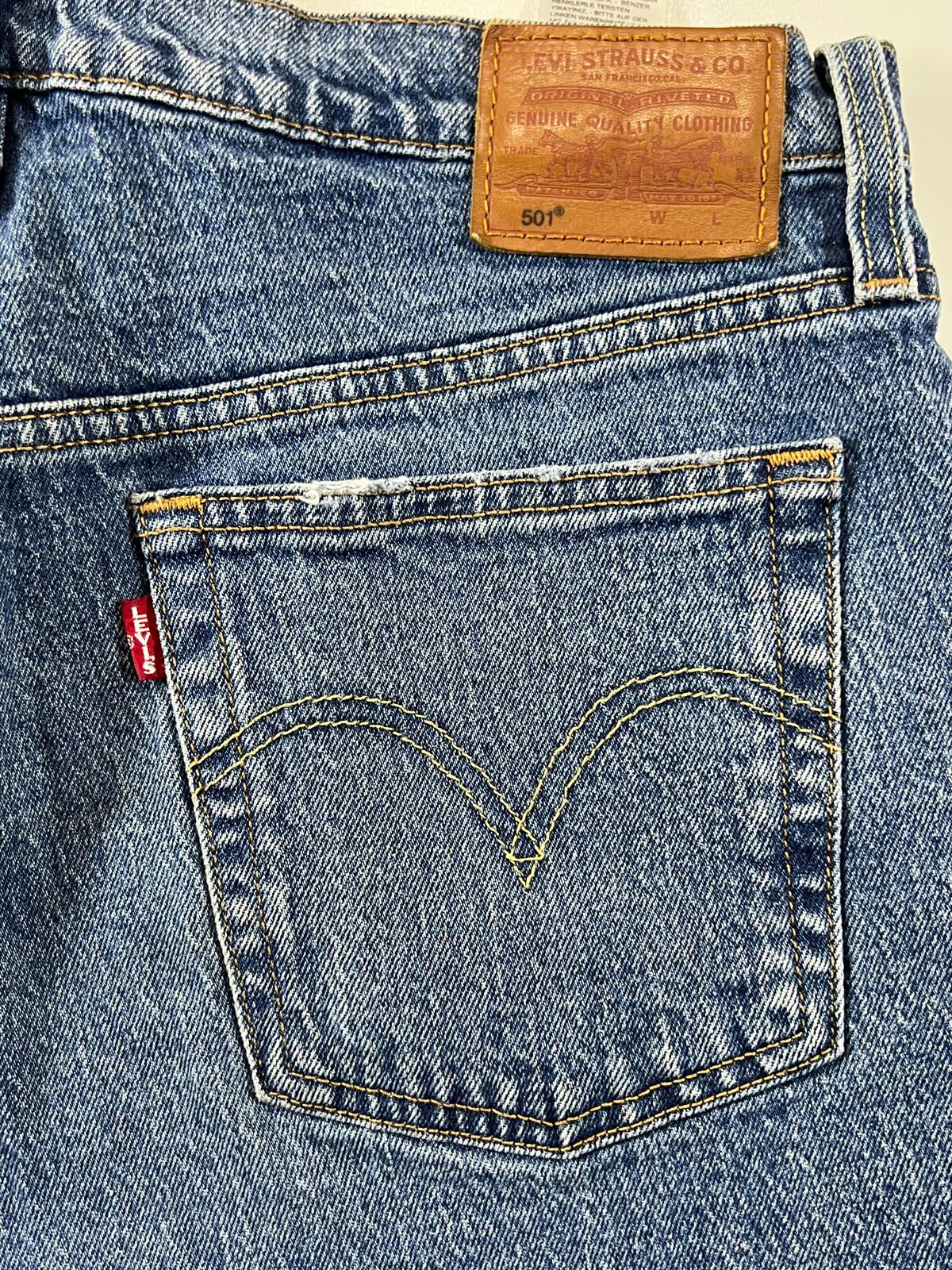 Vintage Levi’s 501 Blue Distressed Denim Shorts 30