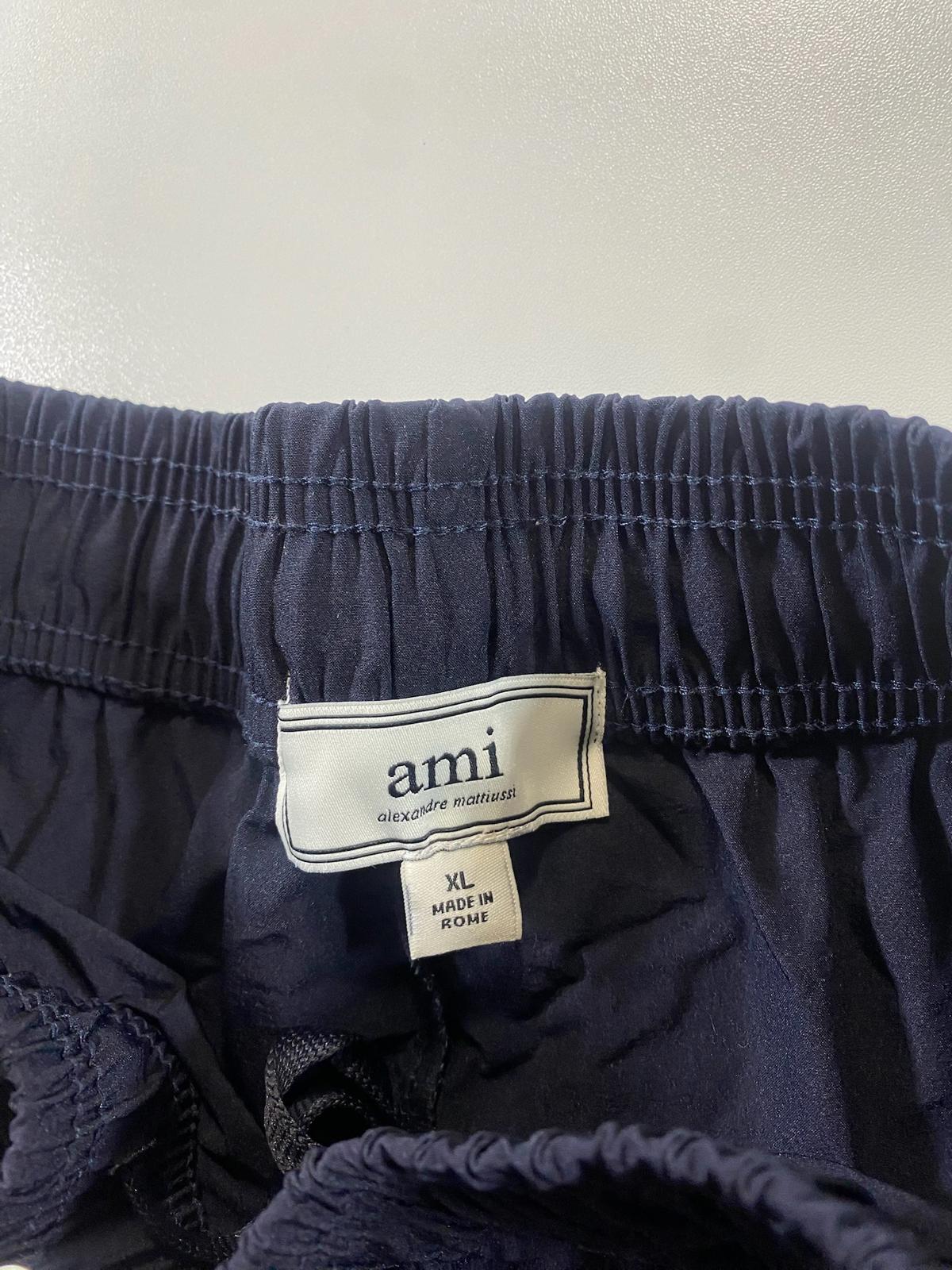 AMI Paris Navy Track Pants with Green Heart Logo