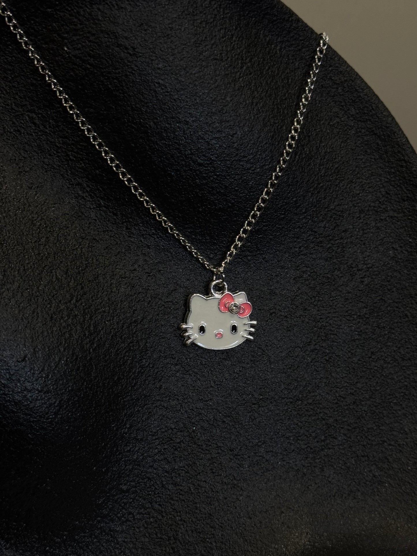 HK FACE PENDANT