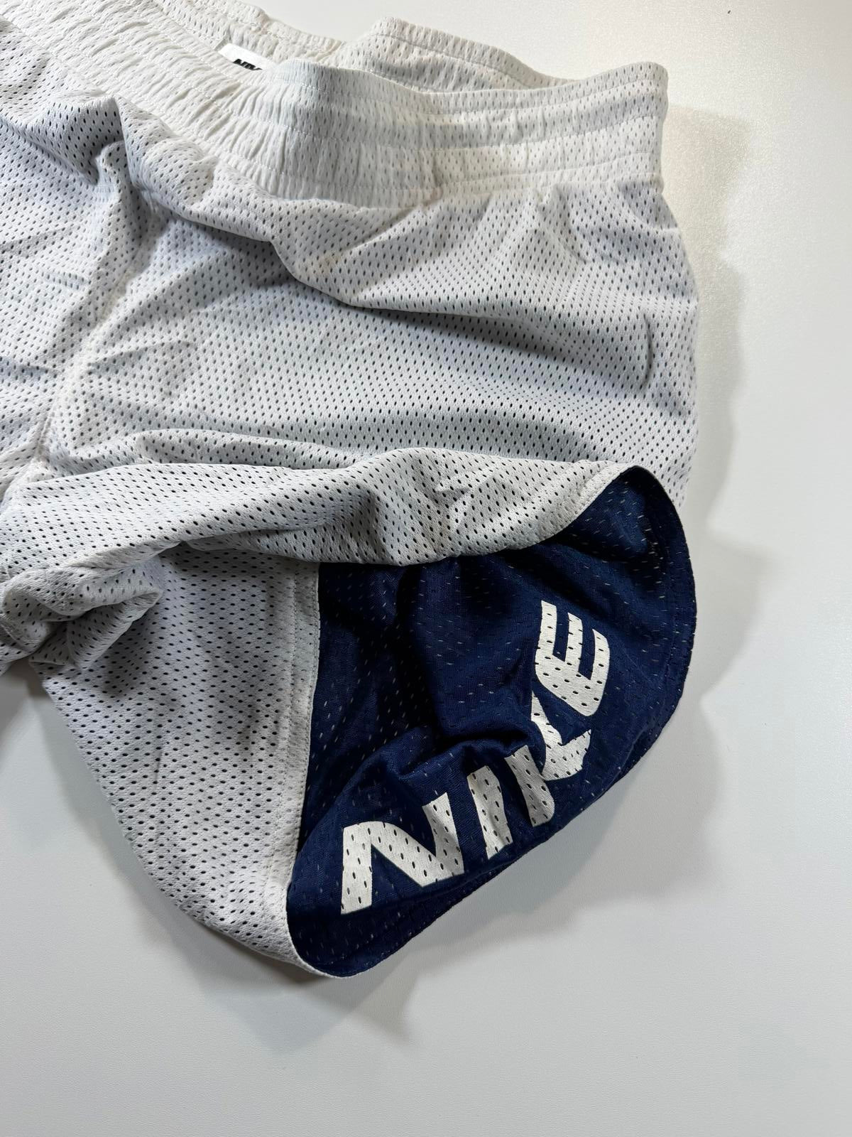 Vintage Nike White Mesh Athletic Shorts with Basketball Logo