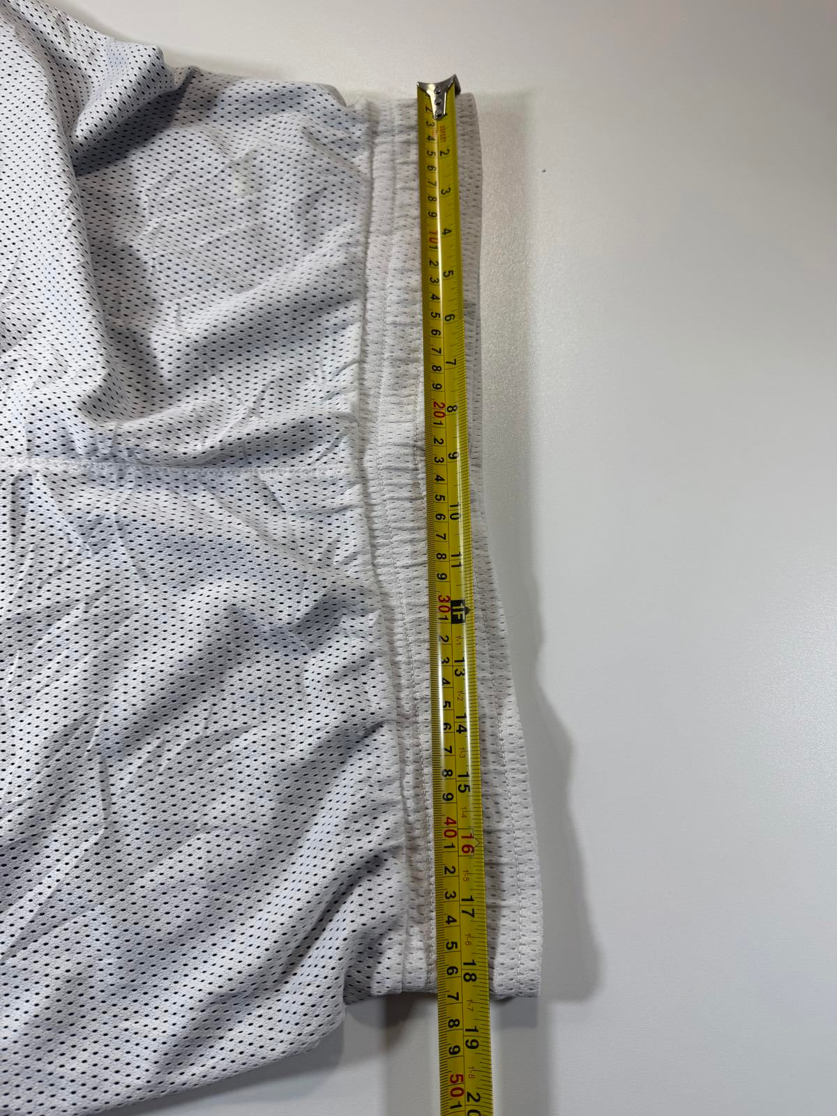 Vintage Nike White Mesh Athletic Shorts with Basketball Logo