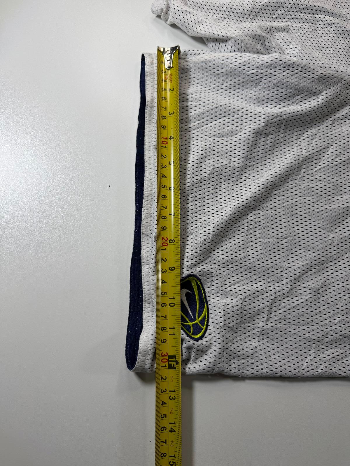 Vintage Nike White Mesh Athletic Shorts with Basketball Logo